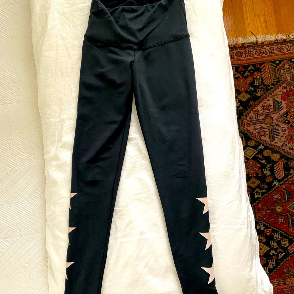 Strut this black with 3 star leggings